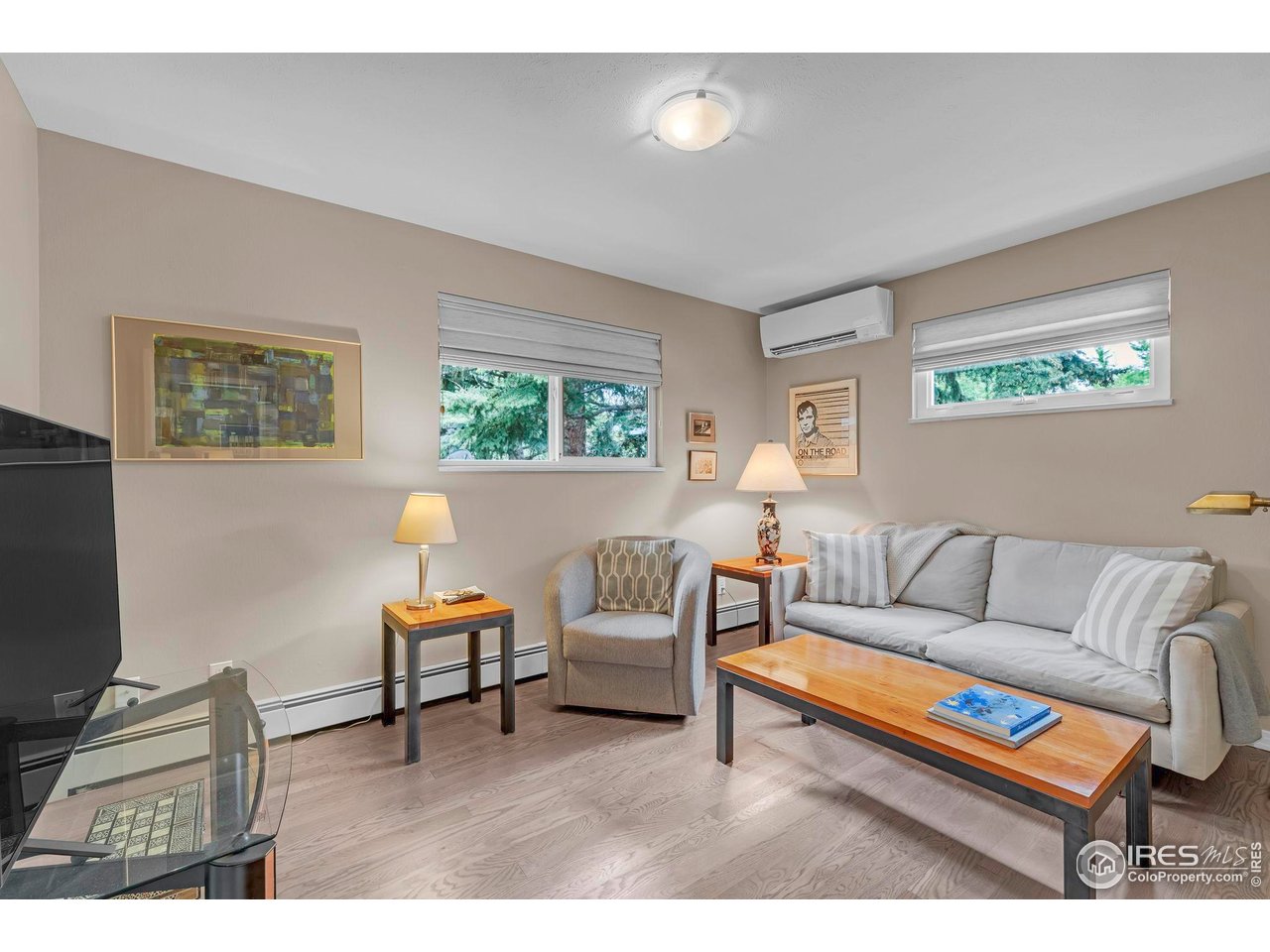 3555 Cloverleaf Drive Boulder, CO 80304 - Photo 13 of 31 a living room with furniture and a flat screen tv