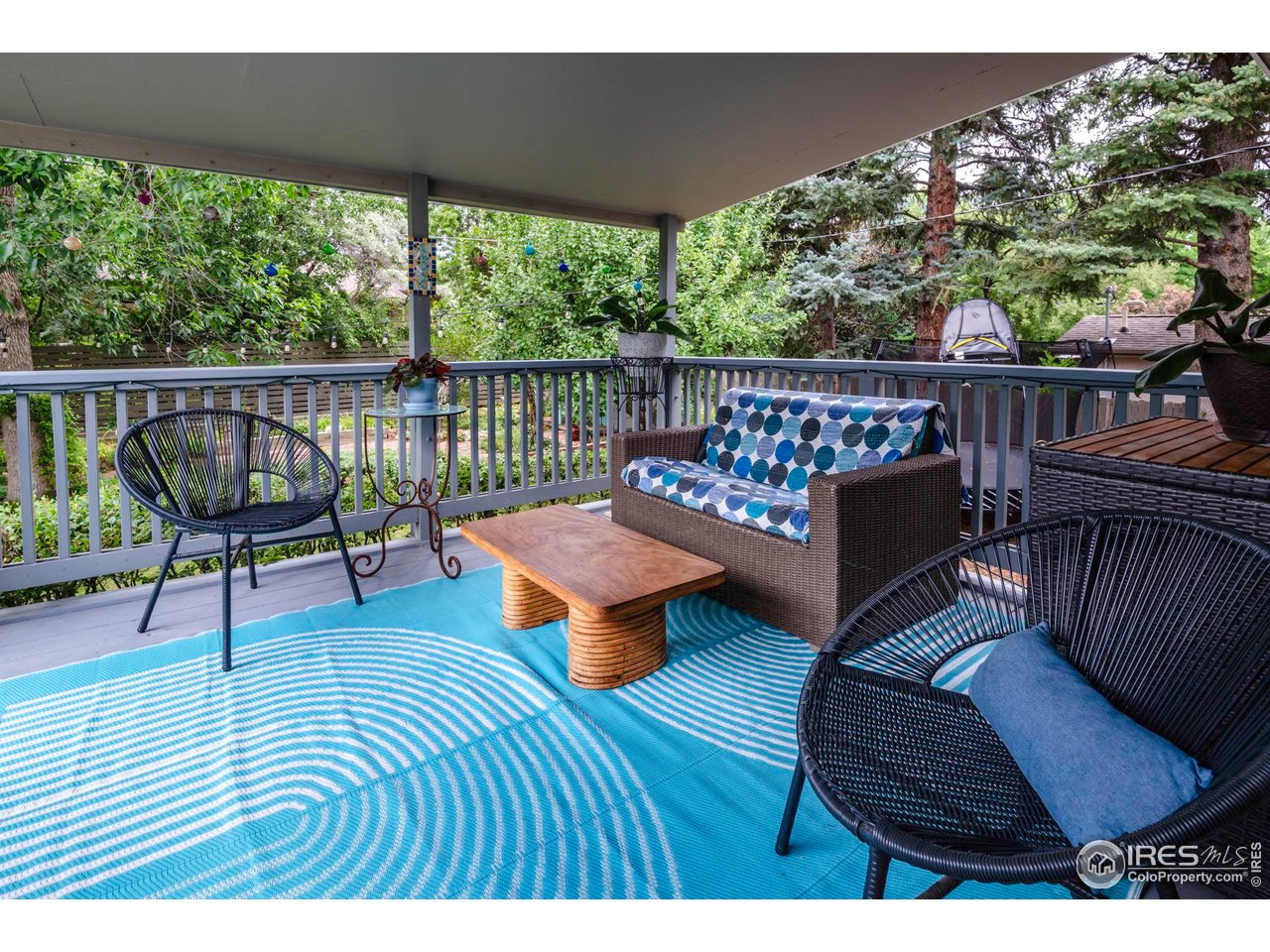 3555 Cloverleaf Drive Boulder, CO 80304 - Photo 19 of 31 a view of a chairs on wooden deck