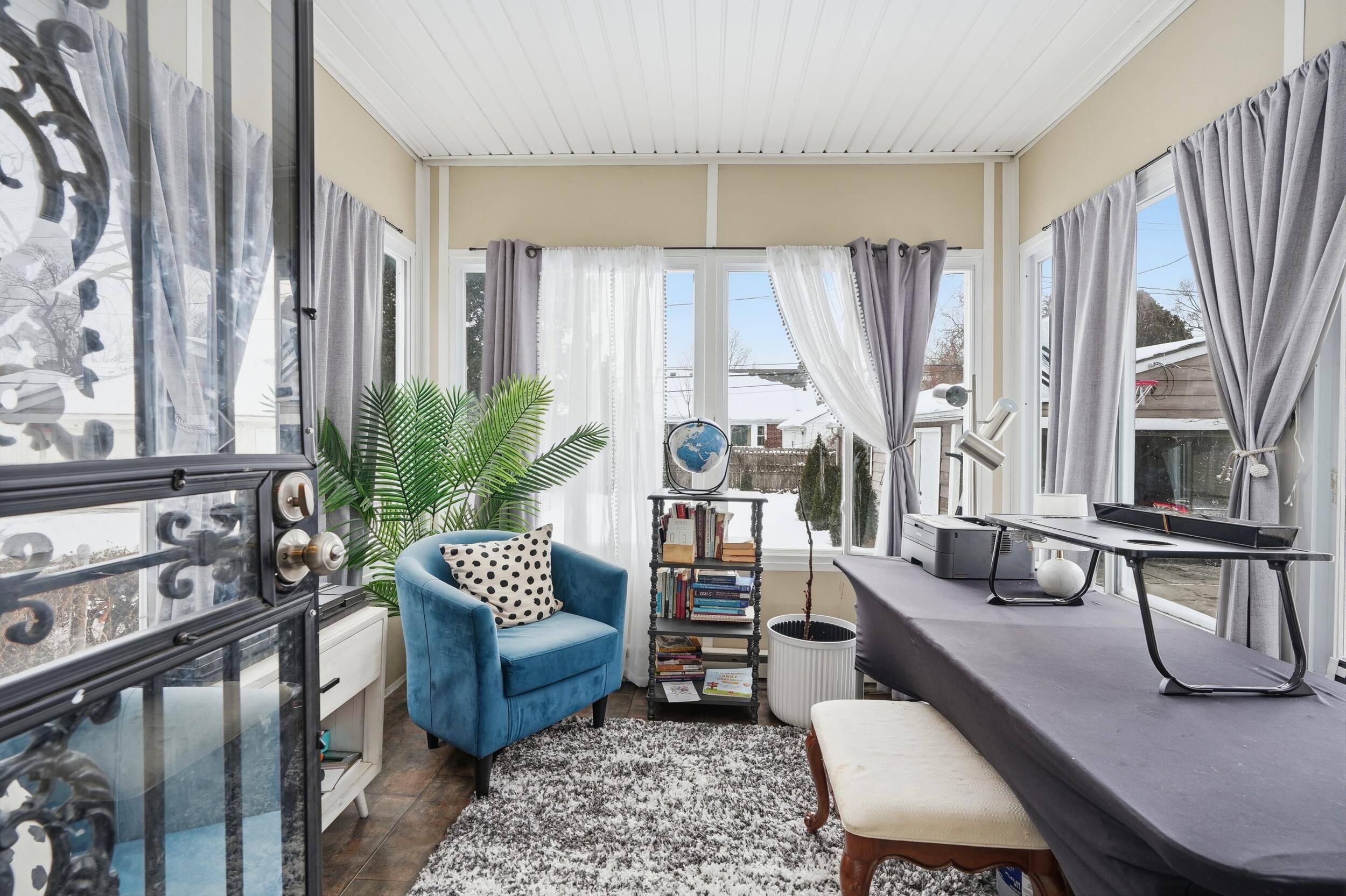 14837 Ashton Road Detroit, MI 48223 - Photo 12 of 26 Three-Season Room