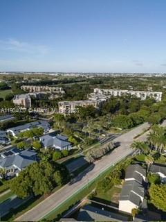 9725 Northwest 52nd Street, Unit 415 Doral, FL 33178 - Photo 23 of 24 an aerial view of a city with lots of residential buildings