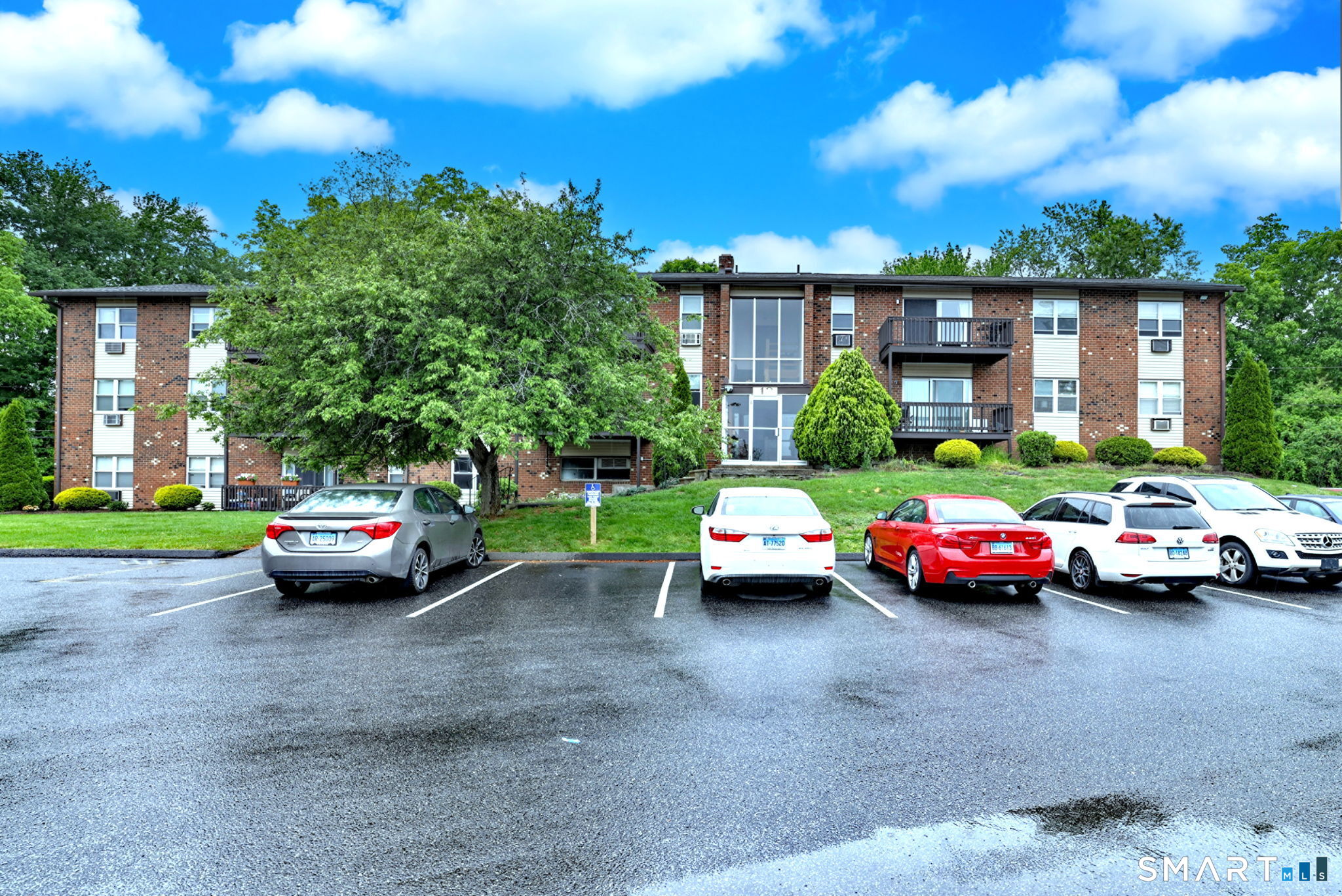 43 Balance Rock Road, Unit 11 Seymour, CT 06483 - Photo 3 of 40 a front view of a house with cars parked