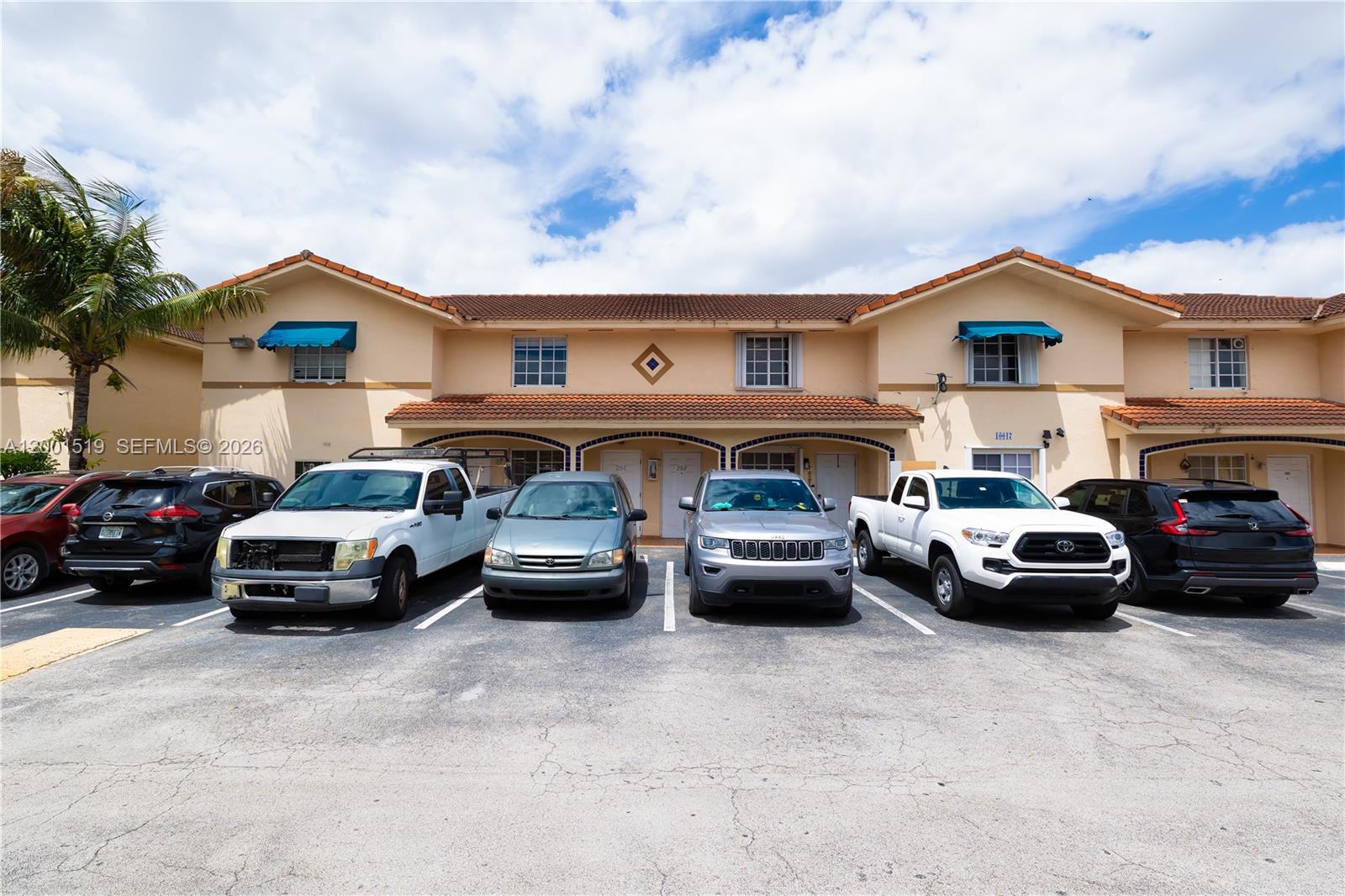 a car parked in front of a house