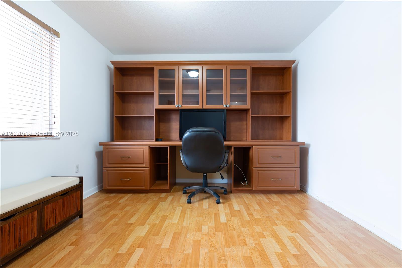 10017 West Okeechobee Road, Unit 202 Hialeah Gardens, FL 33016 - Photo 26 of 30 a workspace with furniture