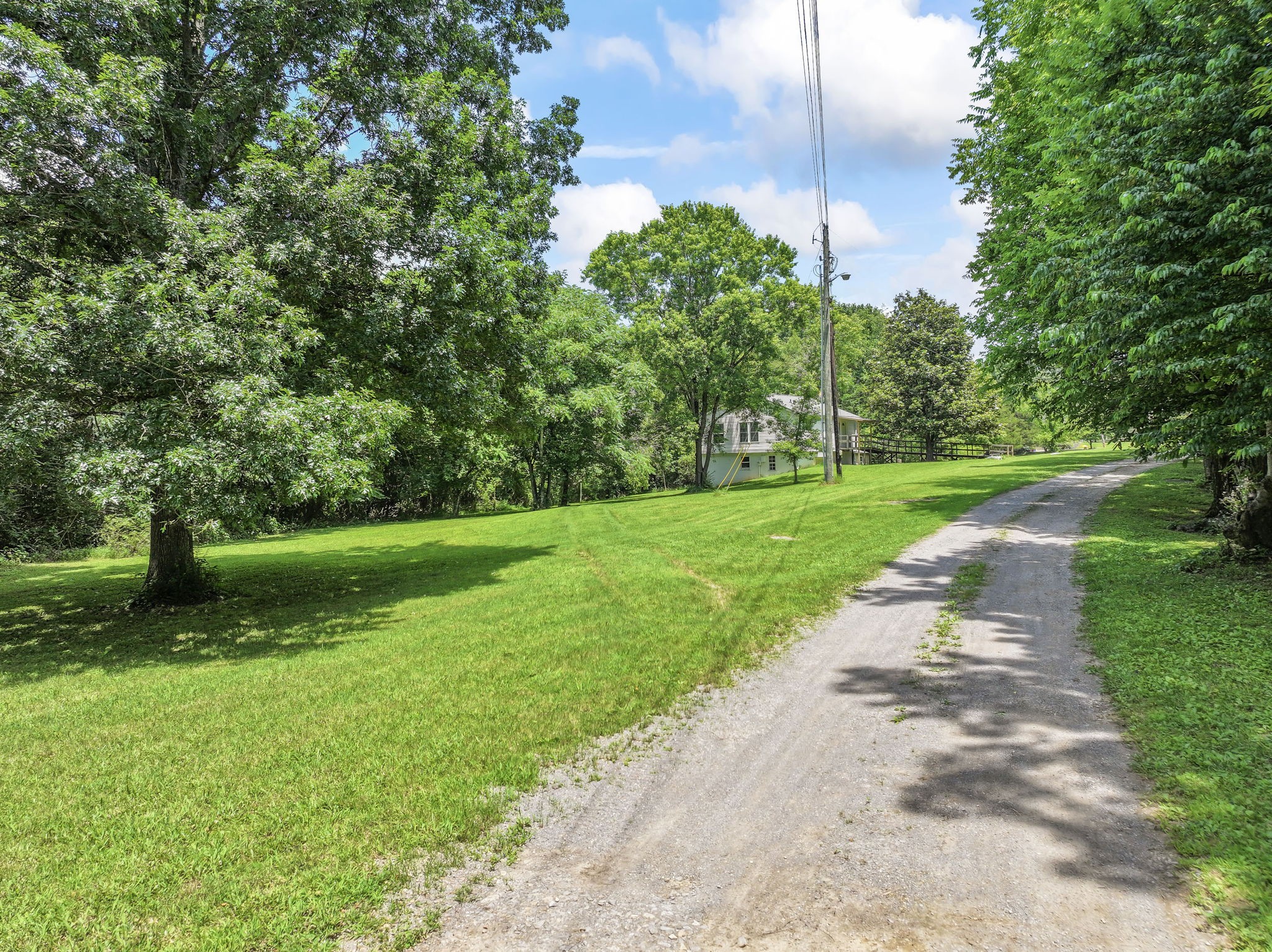 7723 Almaville Road Murfreesboro, TN 37128 - Photo 4 of 5 a view of a park with plants and trees