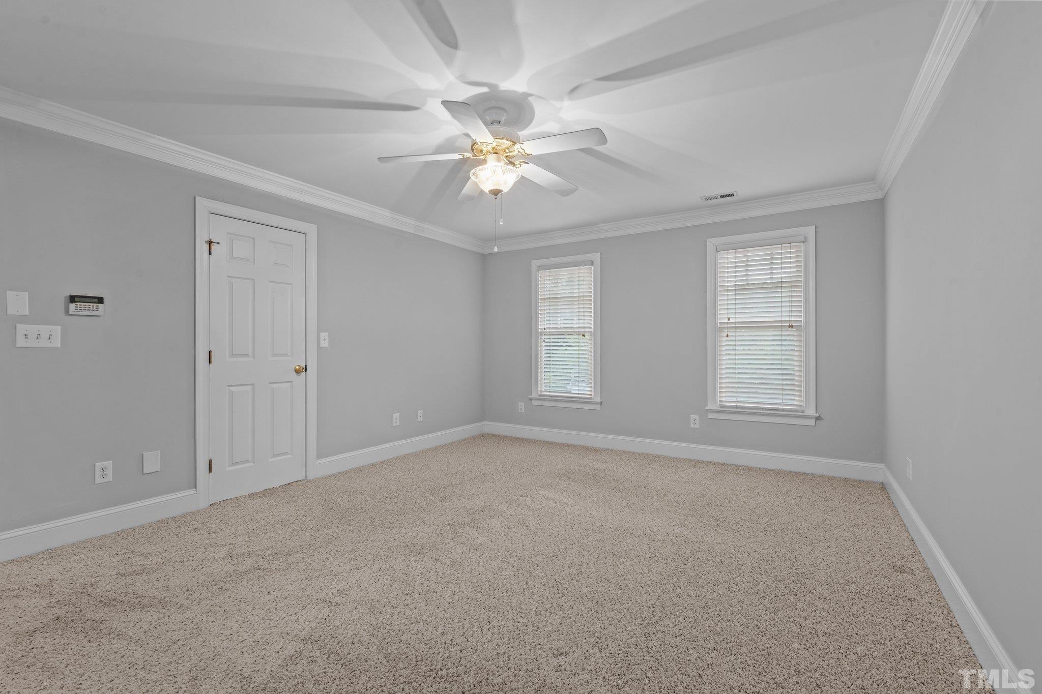 4019 Grayson Ridge Court Raleigh, NC 27613 - Photo 39 of 46 a view of an empty room with a window