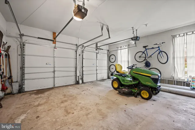 a bathroom with a sink a toilet and a shower