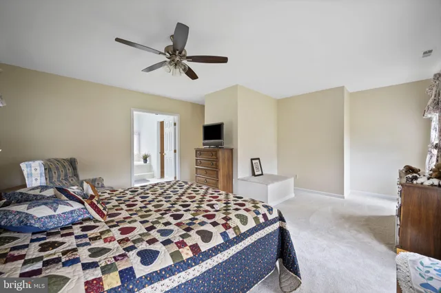 a bathroom with a bathtub and a sink