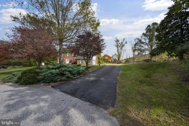 a view of a street with a houses
