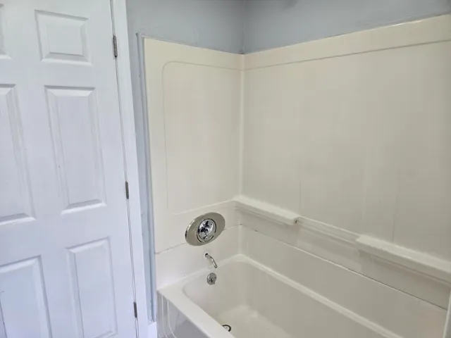 a bathroom with a bathtub