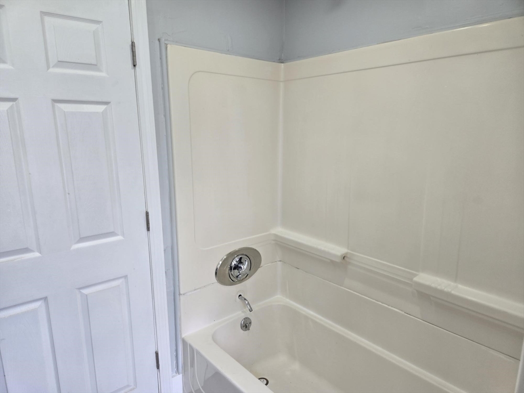 90 Quequechan Street, Unit 2 Fall River, MA 02723 - Photo 14 of 20 a bathroom with a bathtub