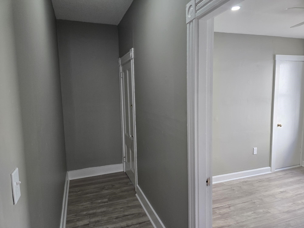 90 Quequechan Street, Unit 2 Fall River, MA 02723 - Photo 5 of 20 a view of a hallway