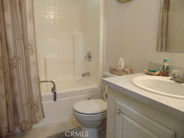 3835 Gardiner Ferry Road, Unit 62 Corning, CA 96021 - Photo 21 of 34 a bathroom with a sink toilet and shower