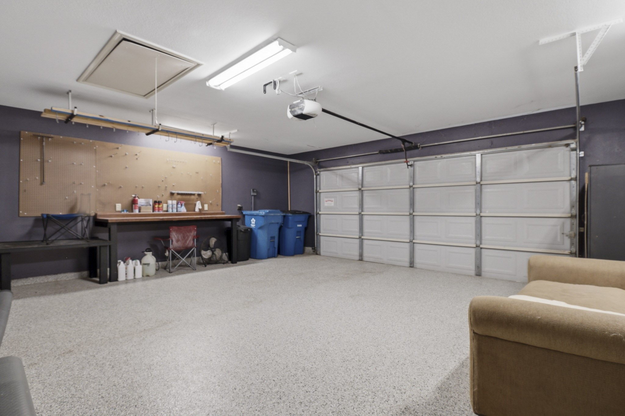 12557 Marina Loop Willis, TX 77318 - Photo 22 of 36 Garage with epoxy flooring