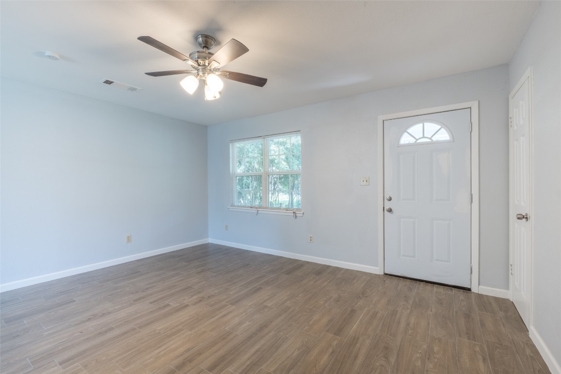 606 West Street Georgetown, TX 78626 - Photo 3 of 36 Entrance foyer featuring wood finished floors and ceiling fan
