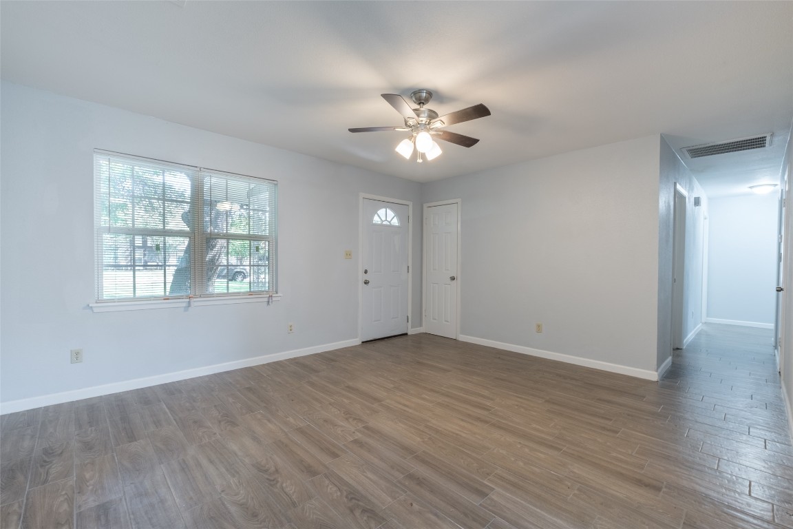 606 West Street Georgetown, TX 78626 - Photo 4 of 36 Entryway featuring wood finished floors and ceiling fan