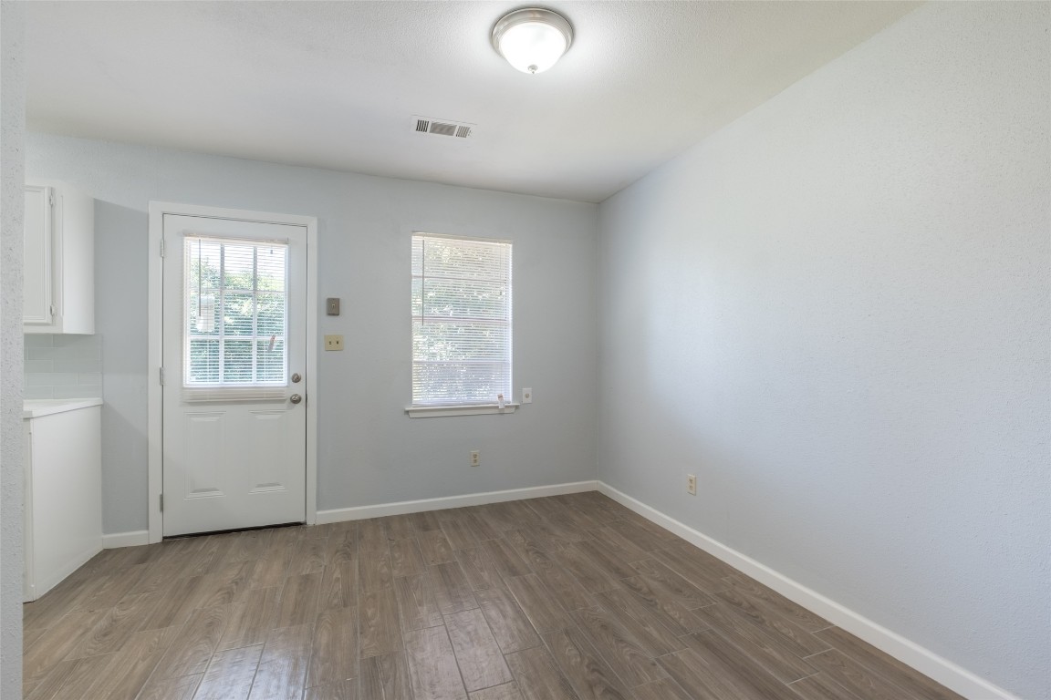 606 West Street Georgetown, TX 78626 - Photo 6 of 36 Entryway with wood finished floors and baseboards