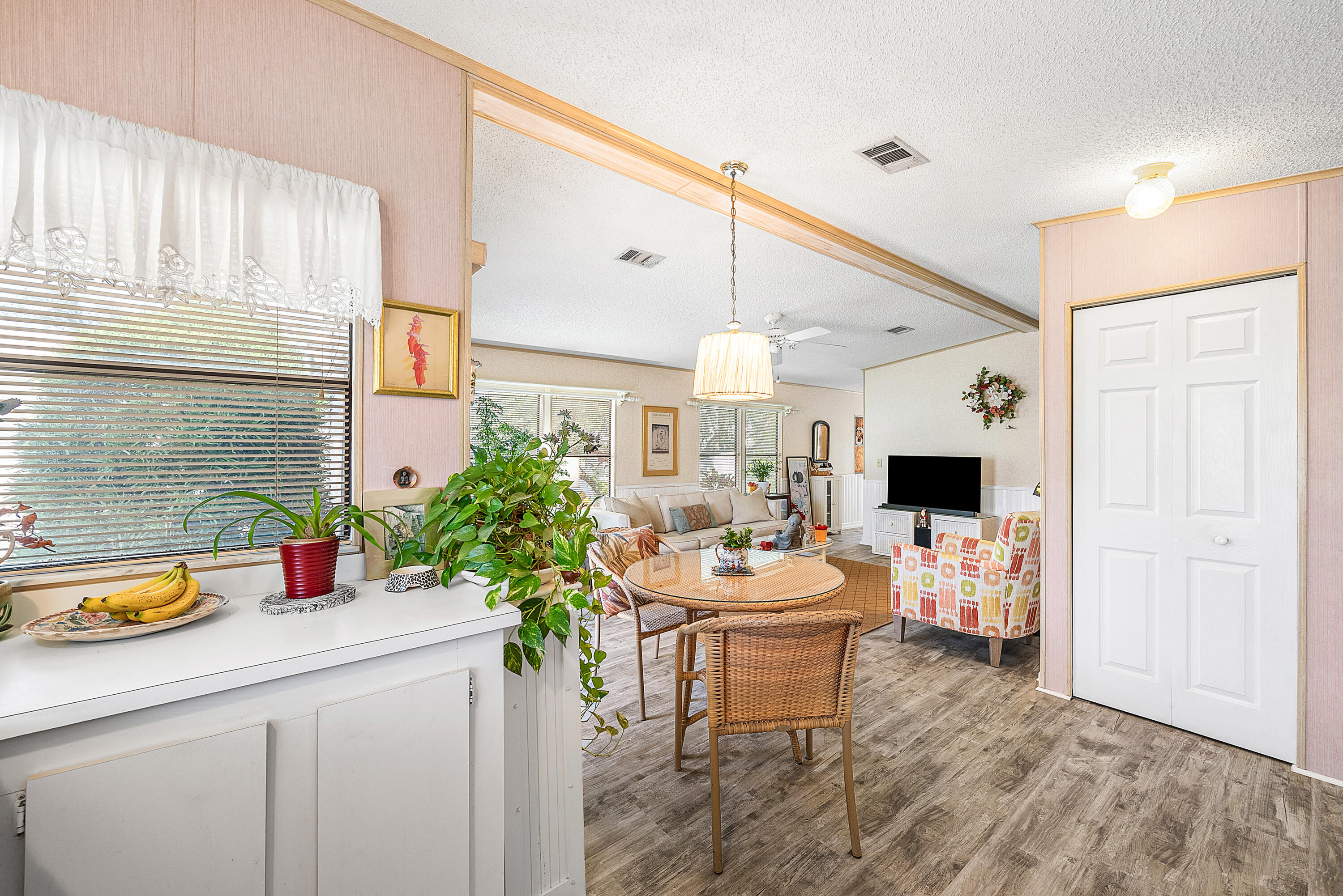 4 East Cedar Drive, Unit CD Briny Breezes, FL 33435 - Photo 11 of 28 a living room with furniture and a flat screen tv