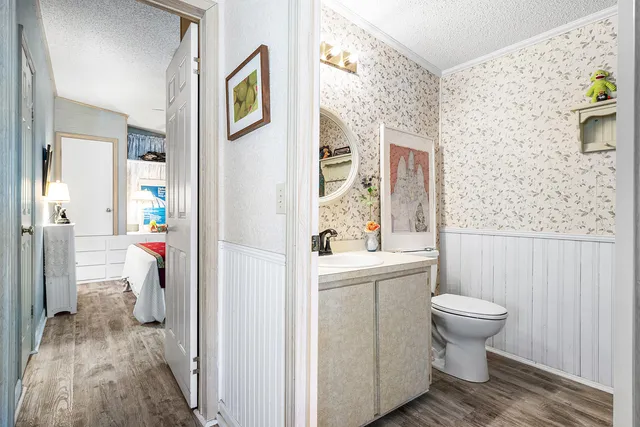 a bathroom with a sink and a toilet