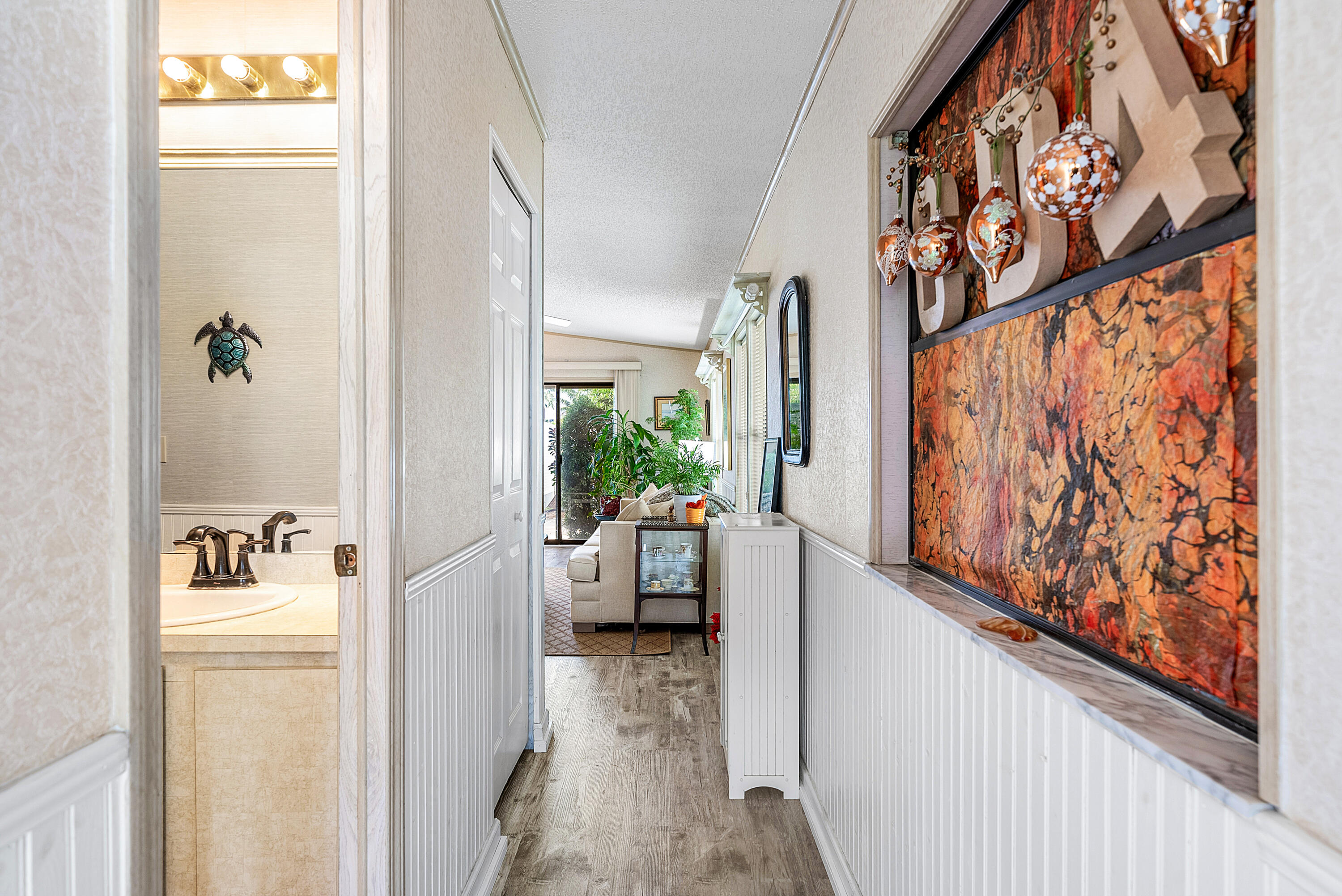 4 East Cedar Drive, Unit CD Briny Breezes, FL 33435 - Photo 21 of 28 a living room with furniture and a window