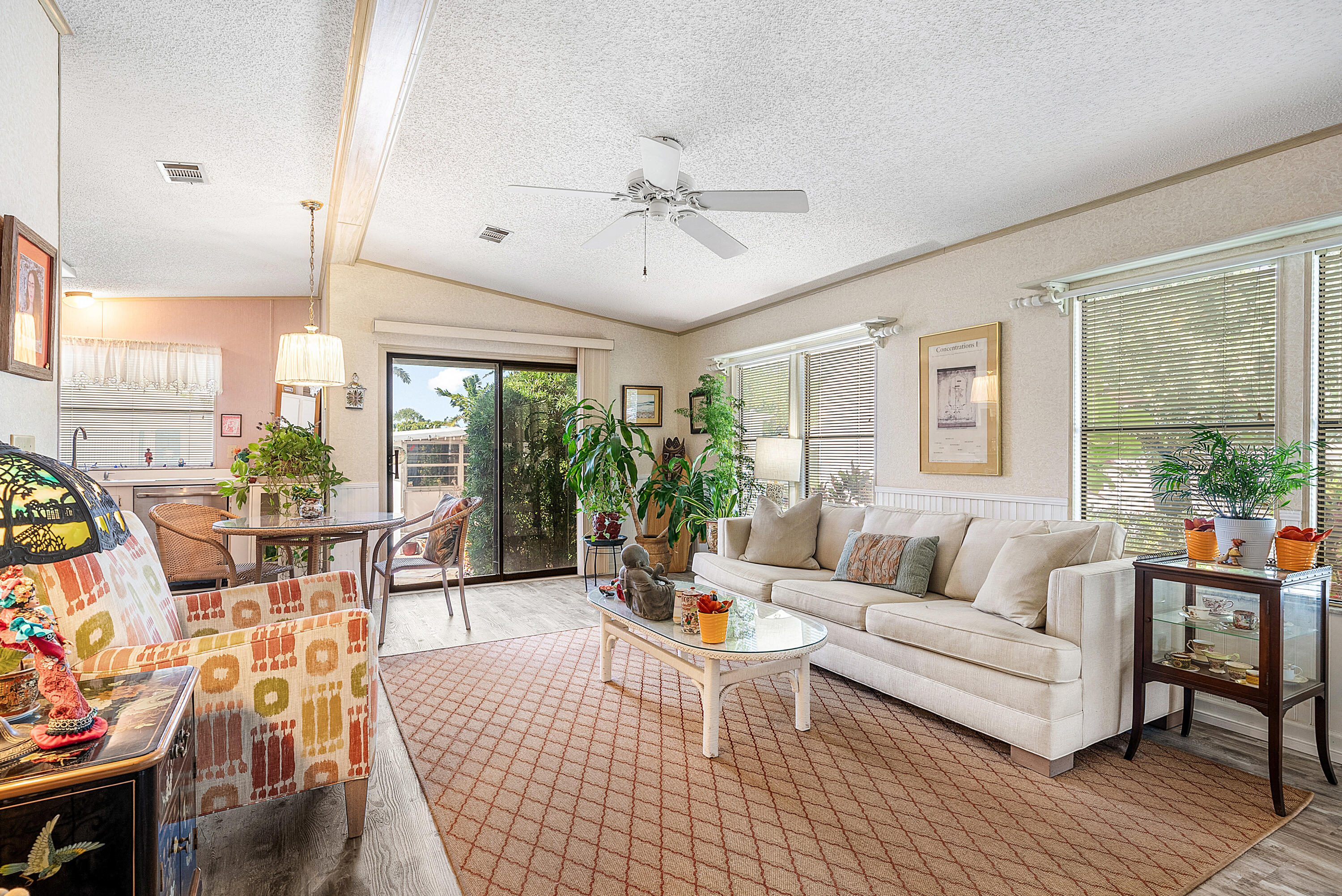 4 East Cedar Drive, Unit CD Briny Breezes, FL 33435 - Photo 4 of 28 a living room with furniture and wooden floor