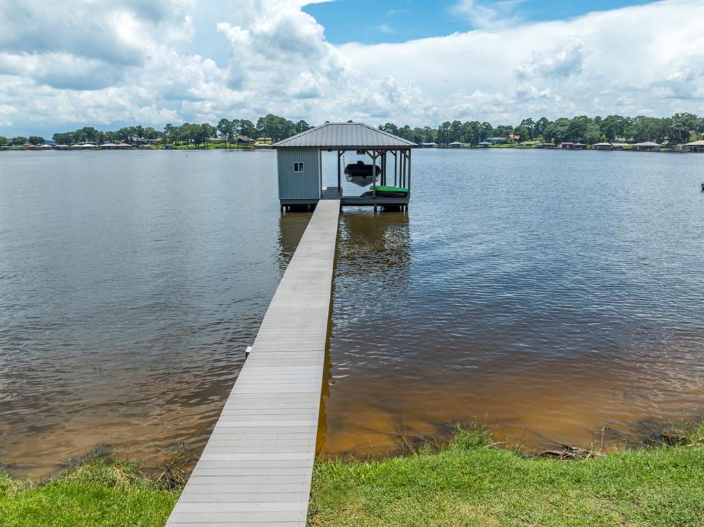 21516 Water Ridge Road Chandler, TX 75758 - Photo 28 of 40 a view of a lake next to a lake