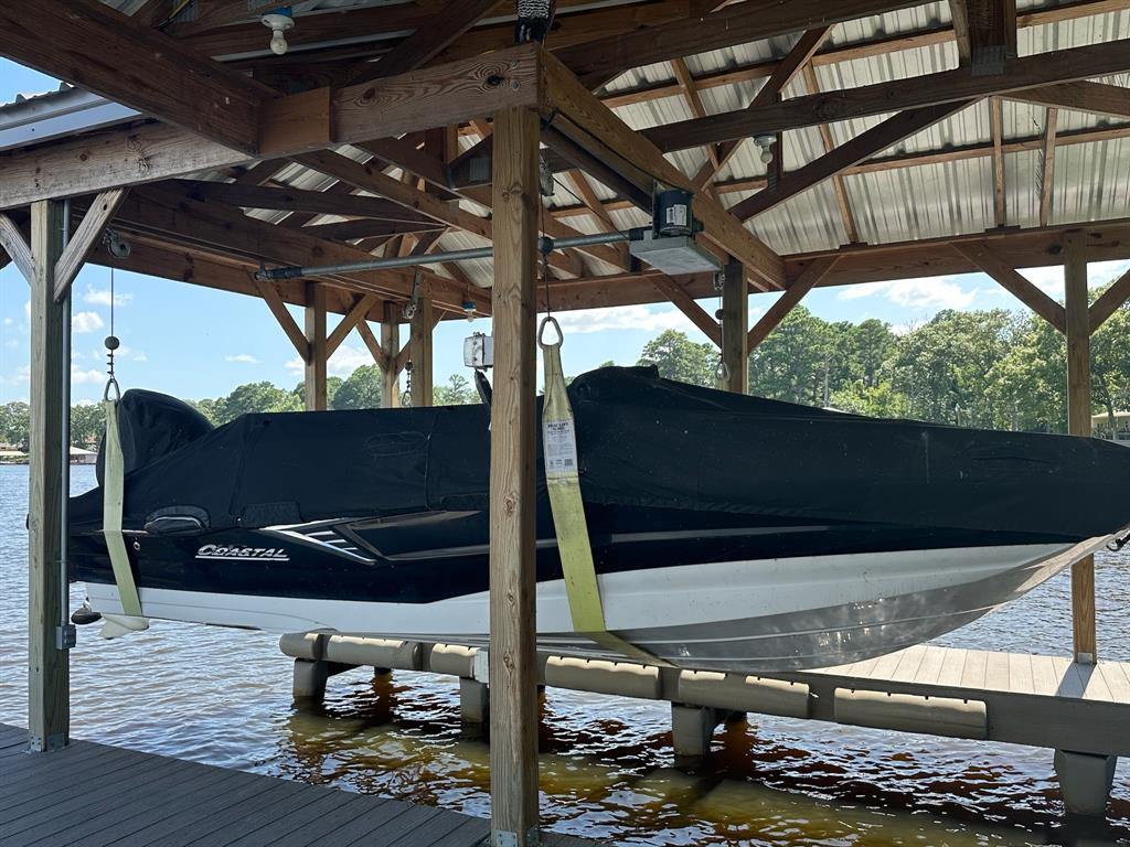21516 Water Ridge Road Chandler, TX 75758 - Photo 32 of 40 a view of room with wooden floor