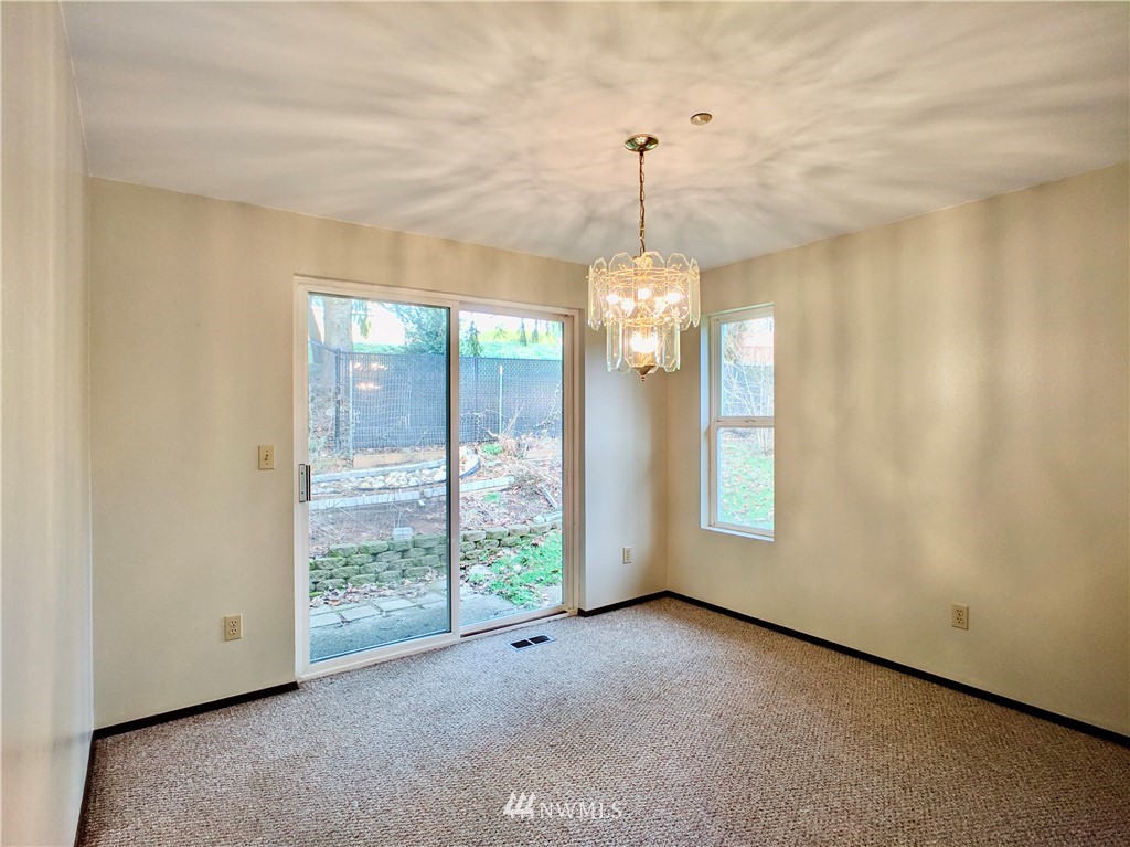17819 Southeast 137th Street Renton, WA 98059 - Photo 12 of 37 a view of a room window and wooden floor