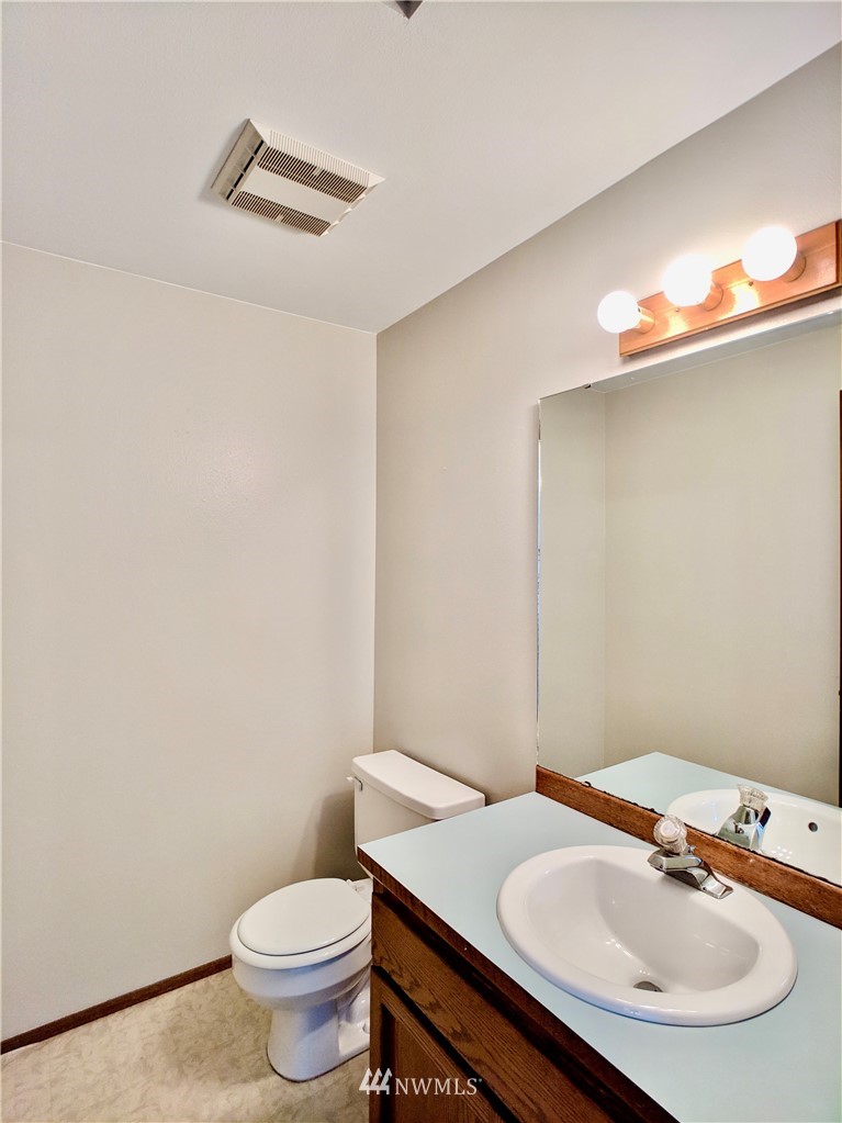 17819 Southeast 137th Street Renton, WA 98059 - Photo 14 of 37 a bathroom with a sink and a toilet
