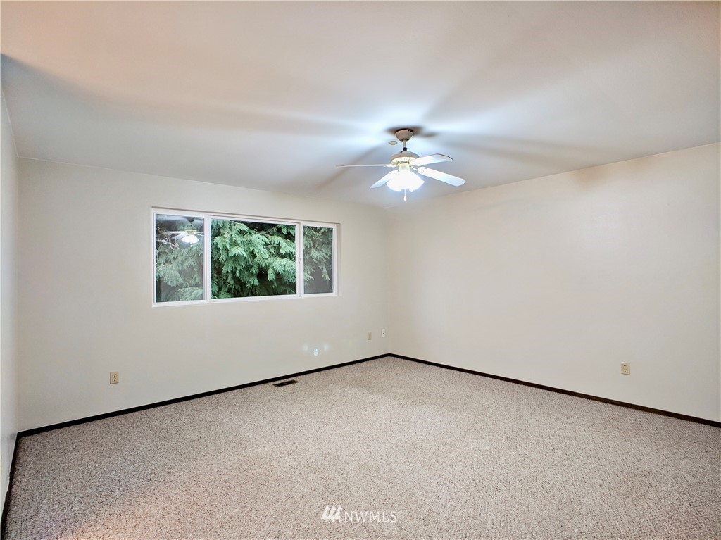 17819 Southeast 137th Street Renton, WA 98059 - Photo 16 of 37 an empty room with a window