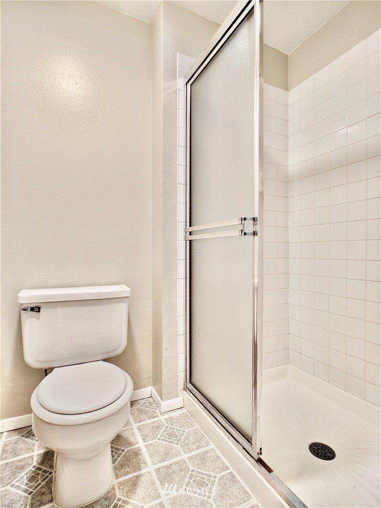 17819 Southeast 137th Street Renton, WA 98059 - Photo 20 of 37 a bathroom with a toilet and a shower