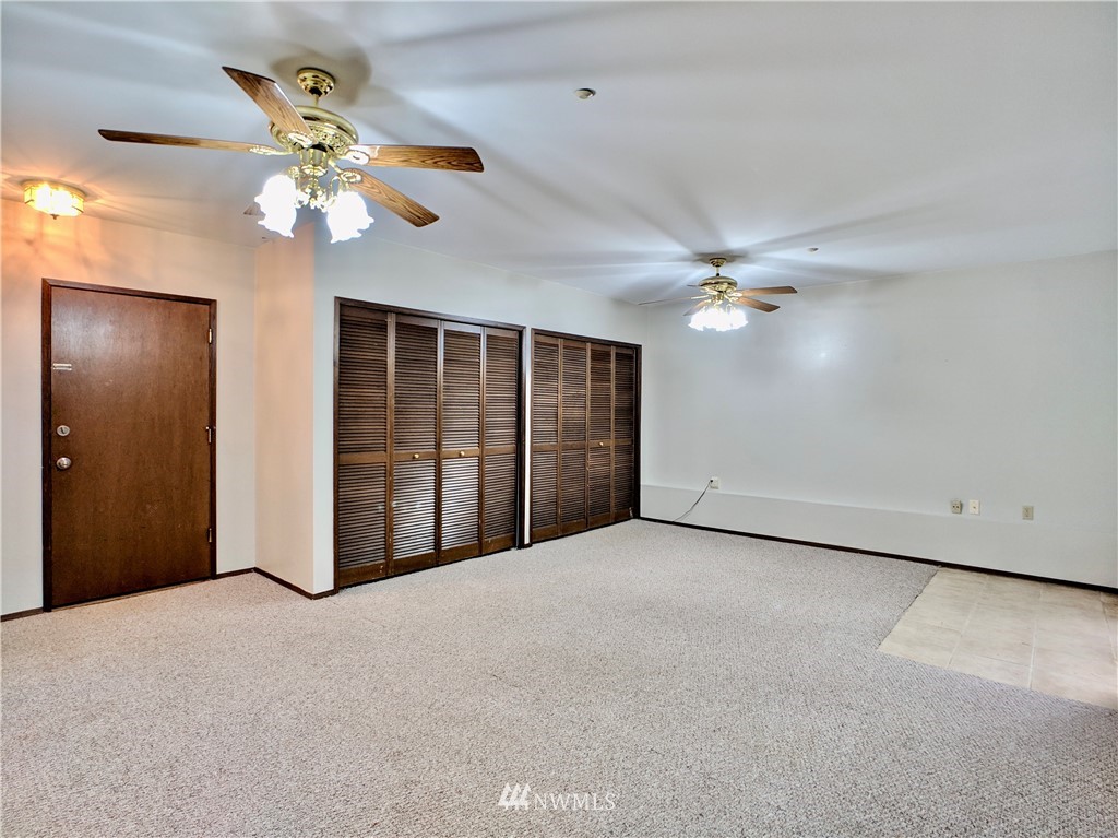 17819 Southeast 137th Street Renton, WA 98059 - Photo 29 of 37 a view of an empty room with a chandelier fan