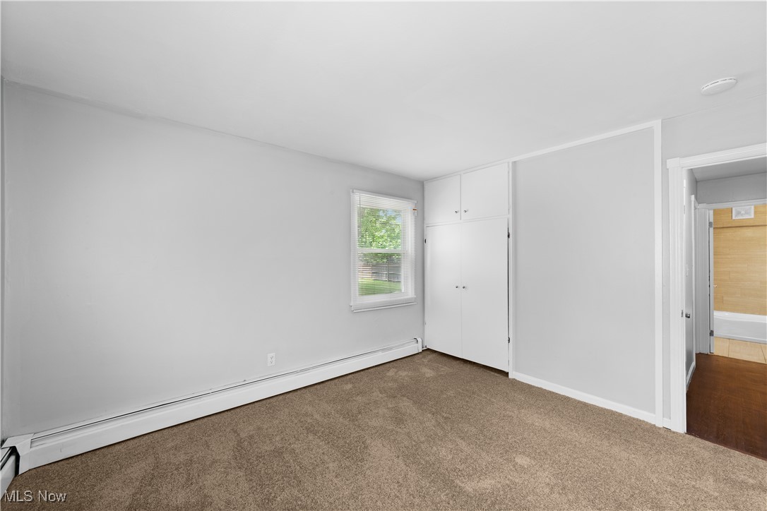 4920 Marigold Road Mentor, OH 44060 - Photo 12 of 34 1 of 2 bedrooms on 1st Floor with new carpeting and freshly painted