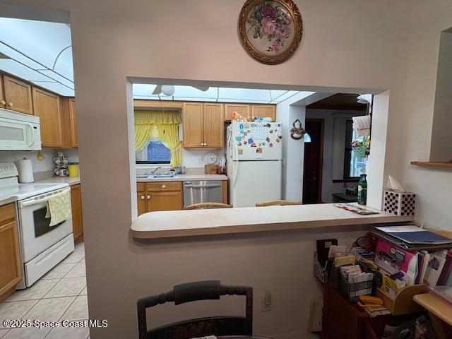 995 Botany Lane Rockledge, FL 32955 - Photo 14 of 44 a kitchen with stainless steel appliances granite countertop a sink and a refrigerator