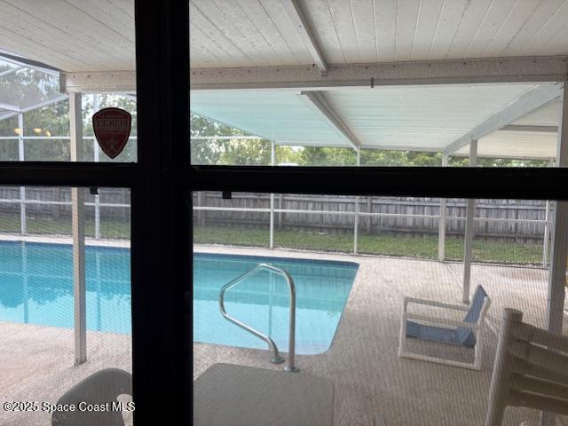 995 Botany Lane Rockledge, FL 32955 - Photo 20 of 64 a view of a porch with a floor to ceiling window