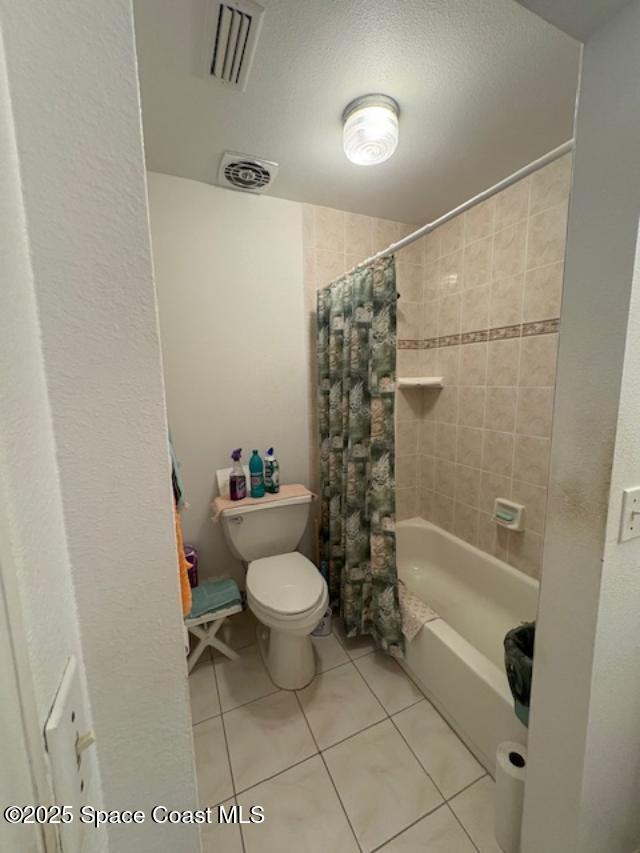 995 Botany Lane Rockledge, FL 32955 - Photo 26 of 44 a bathroom with a toilet and a shower