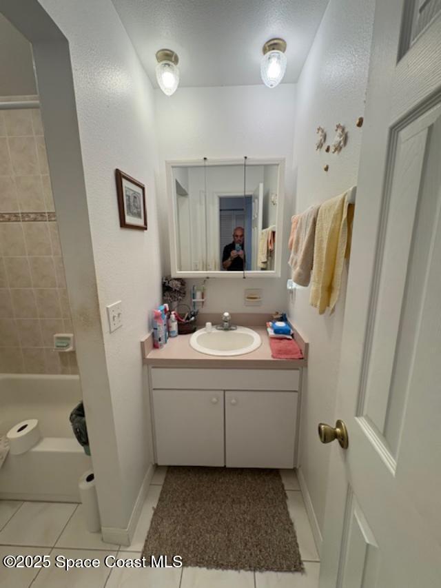 995 Botany Lane Rockledge, FL 32955 - Photo 27 of 44 a bathroom with a sink mirror and toilet