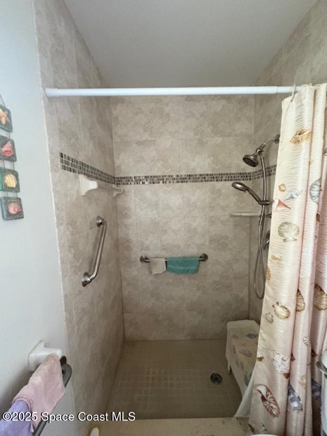 995 Botany Lane Rockledge, FL 32955 - Photo 40 of 44 a bathroom with a shower