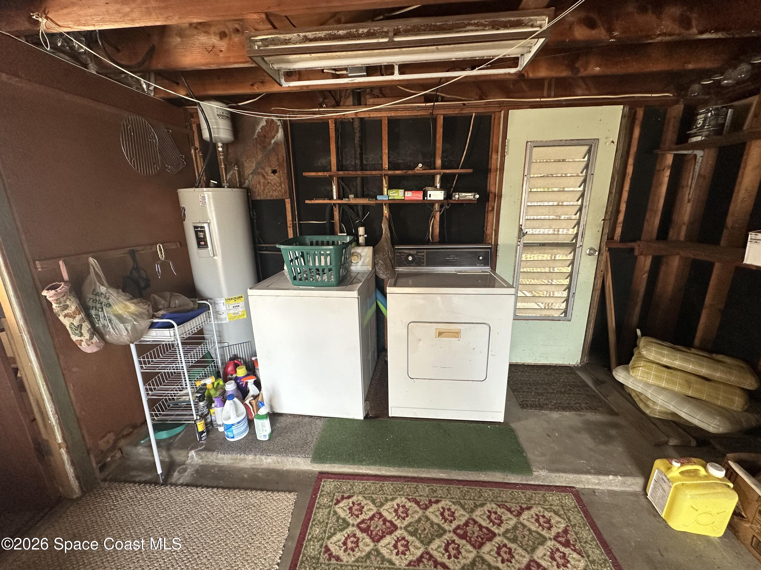 995 Botany Lane Rockledge, FL 32955 - Photo 47 of 64 a utility room with dryer and washer