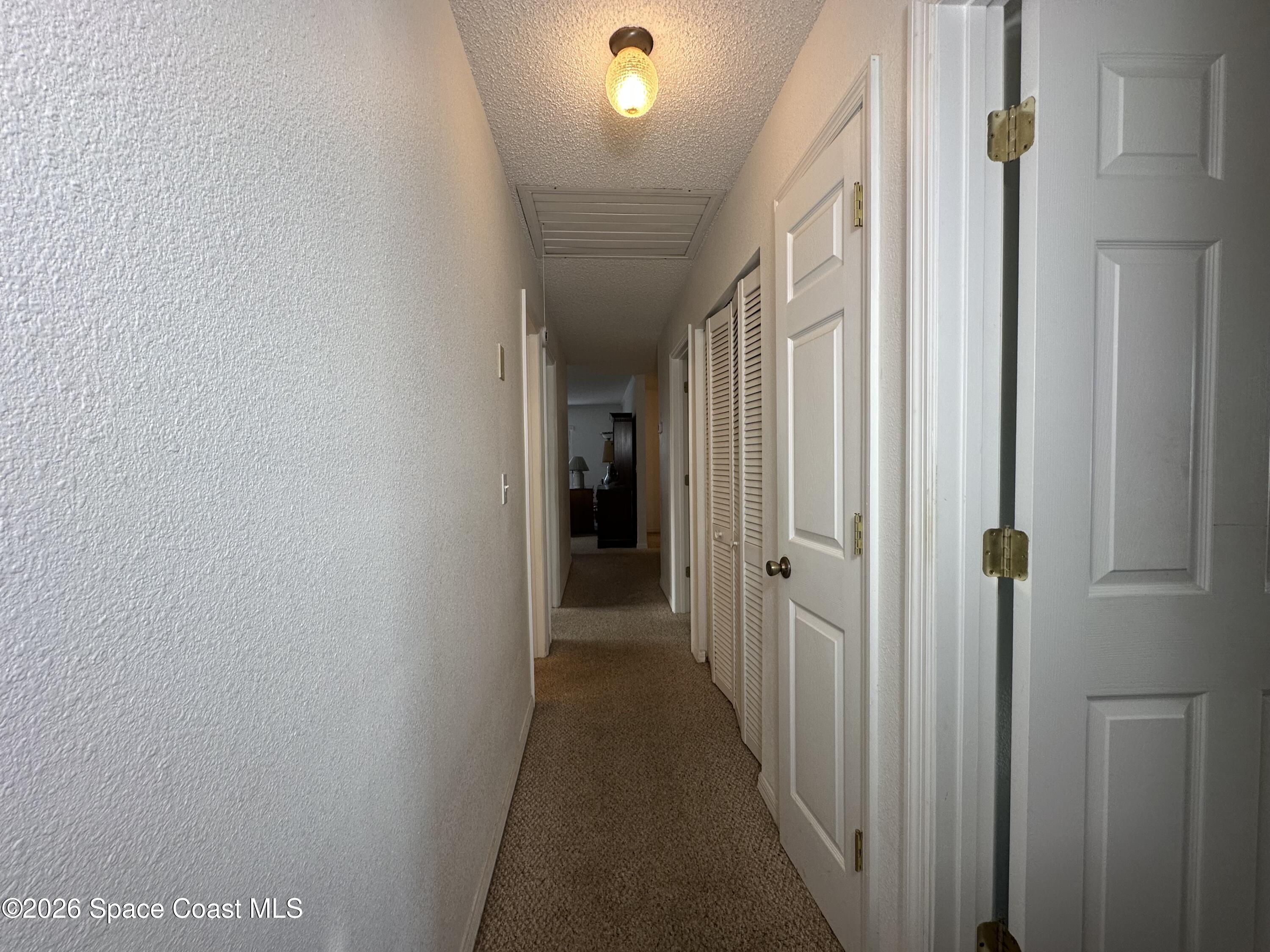 995 Botany Lane Rockledge, FL 32955 - Photo 56 of 64 a view of a hallway