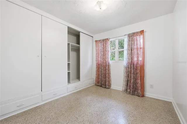 an empty room with windows