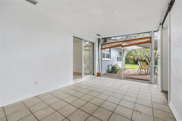 a view of an empty room and window