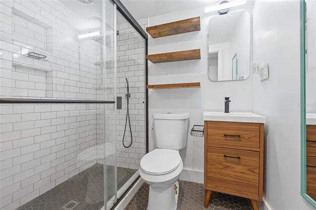 a bathroom with a toilet and a sink