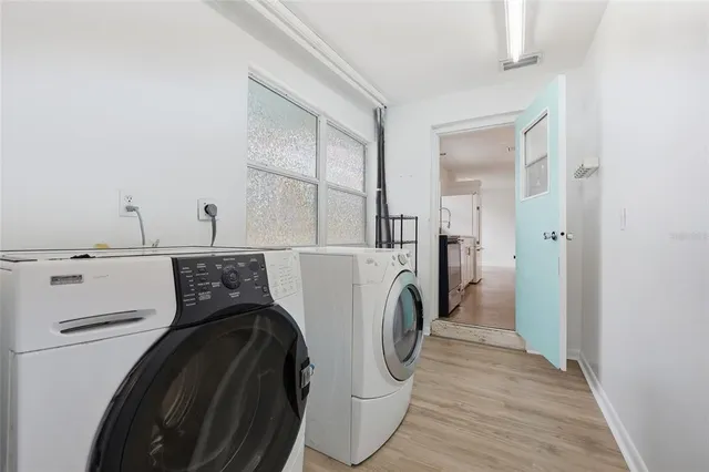 a utility room with dryer and washer