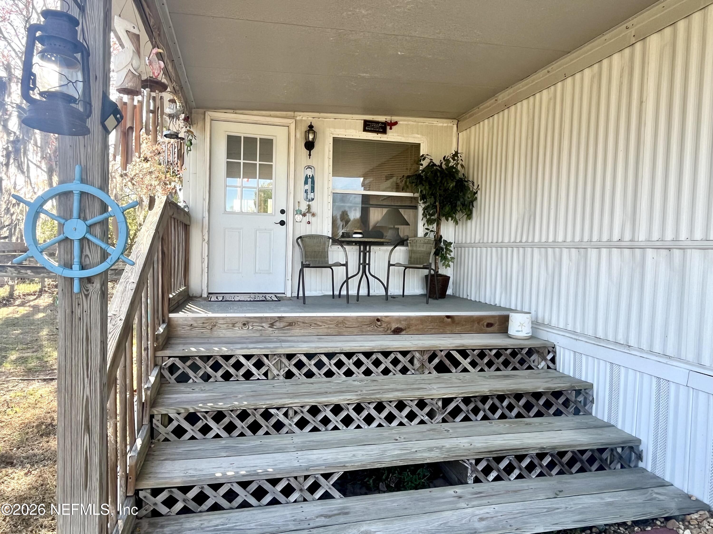 174 Buchanan Circle Satsuma, FL 32189 - Photo 3 of 16 a view of a balcony