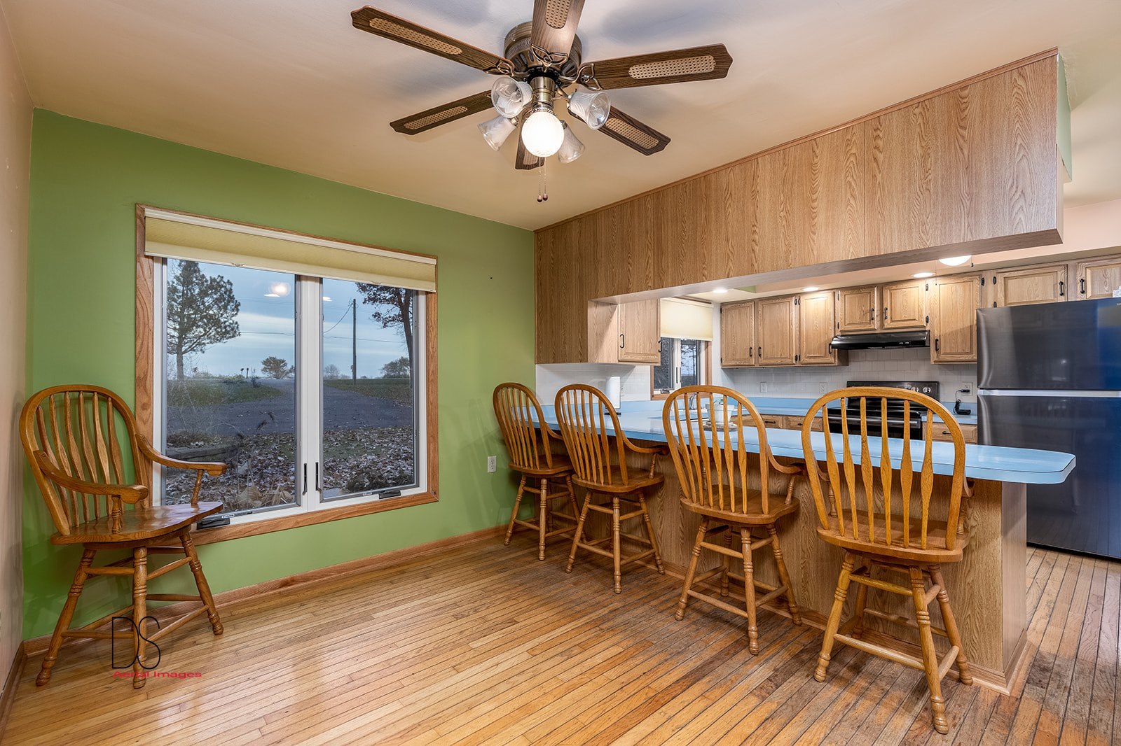 2863 East 2575th Road Marseilles, IL 61341 - Photo 19 of 37 a dining room with furniture a chandelier and wooden floor
