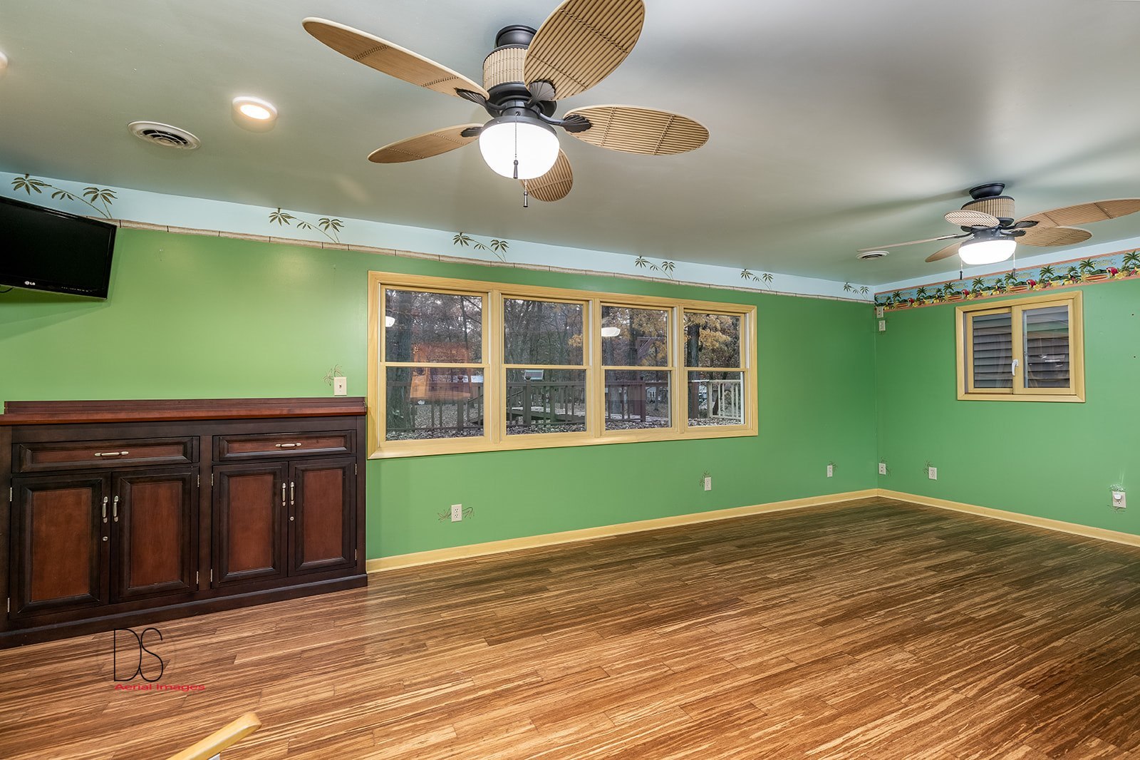 2863 East 2575th Road Marseilles, IL 61341 - Photo 26 of 37 a view of a livingroom with wooden floor and a ceiling fan
