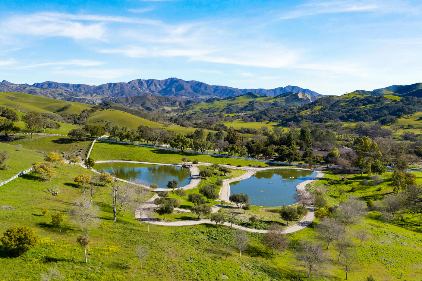 7351 Happy Canyon Road Santa Ynez, CA 93460 - Photo 5 of 48 a view of a lake with a mountain in the background