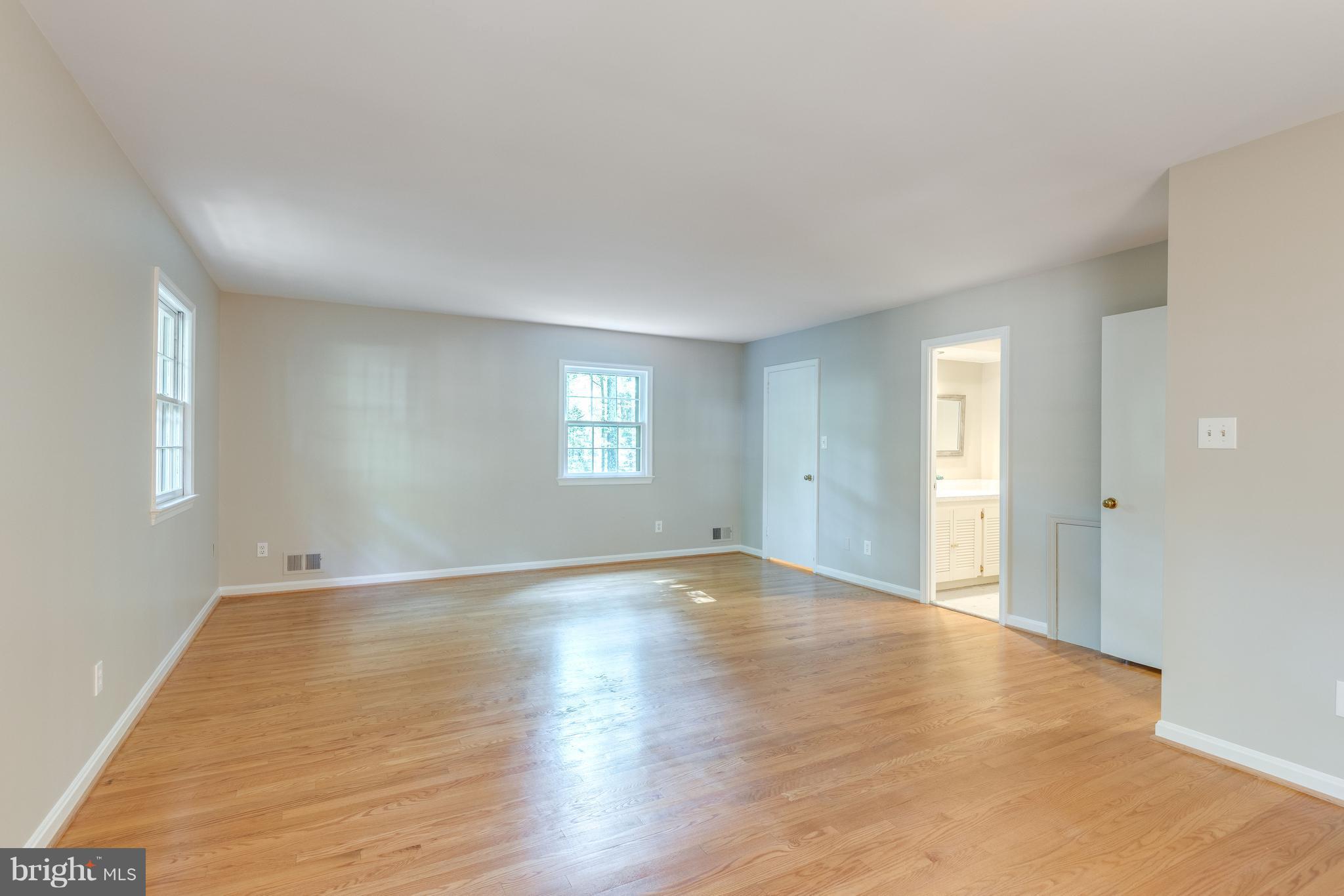 2402 Black Cap Lane Reston, VA 20191 - Photo 17 of 30 Master BR Walk-in & Full Bath/laundry chute