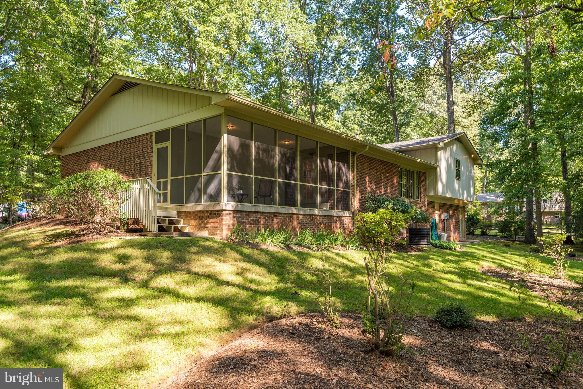 2402 Black Cap Lane Reston, VA 20191 - Photo 28 of 30 Back exterior view of the screen porch