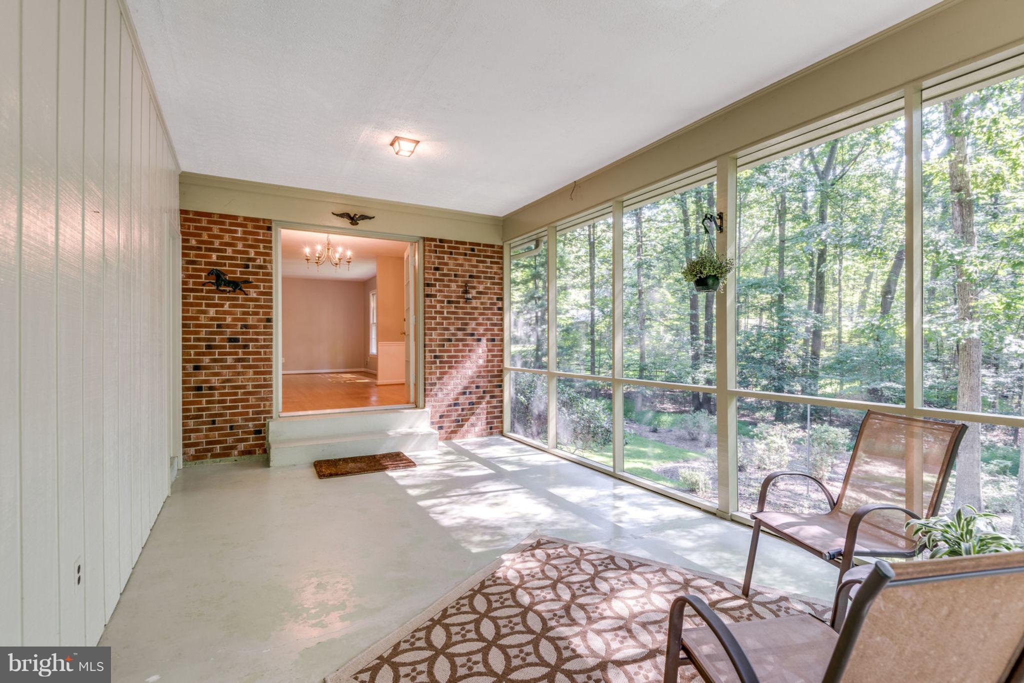 2402 Black Cap Lane Reston, VA 20191 - Photo 8 of 30 Lovely Screened Porch flat lot backing to trees